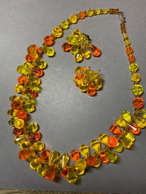 Vintage yellow orange faceted lucite plastic bead… - image 1