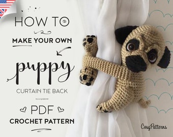 May include: Crochet pattern for a cute puppy curtain tie back. The pattern is available as a PDF download. The image shows a crocheted puppy in beige and brown colors holding onto a white curtain.