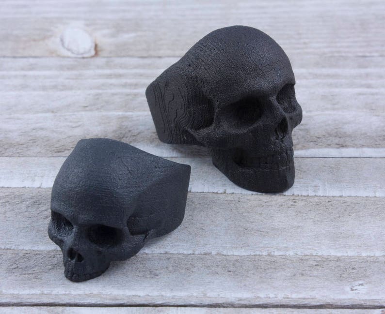 blackened steel skull rings with and without lower jaw