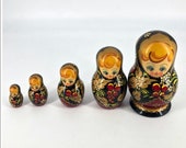 Original Hand Painted Wooden Russian Nesting Dolls Featuring Vibrant Assorted Colors With Intricate Tribal Designs