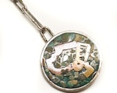 Vintage Sterling Silver Aztec Mayan Collectable Keychain Featuring Rosette Pendant Design With Inlaid Finish