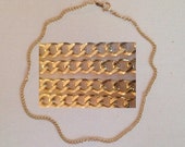 Beautiful Vintage 10k Yellow Gold Flat Chain Designer Bracelet Featuring Iconic Interlocking Style Design