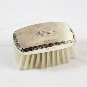 Vintage Sterling Silver Victorian Ladies Vanity Brush Featuring Topside Detailed Scrolling For Elegant Powder Rooms