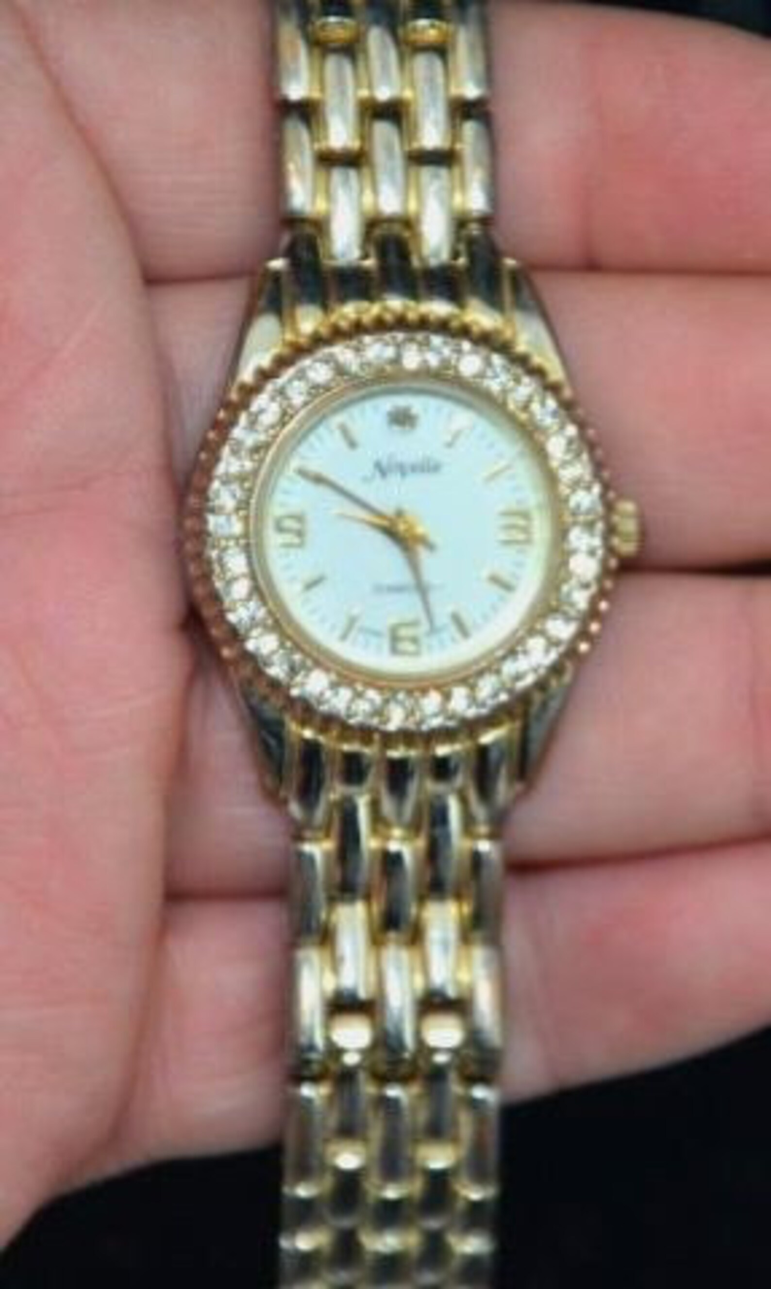 Vintage Ladies Novelle Quartz Brushed Gold Tone Diamond Bezel Watch Featuring Original Snap