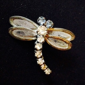 Enchanting Vintage Silver Tone Designer Petite Dragonfly Brooch Featuring Clear Body Rhinestones and Powder Blue Rhinestone Eyes