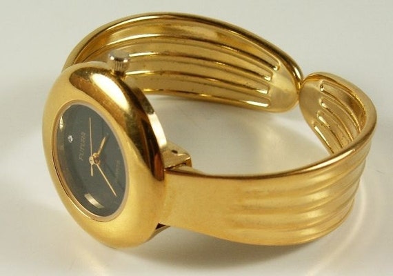 Lovely Vintage Futura gold tone quartz timepiece … - image 1