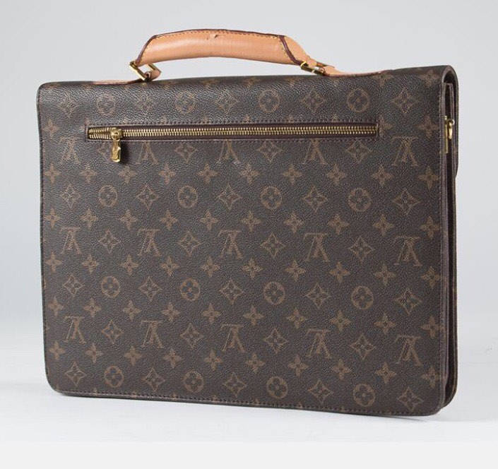 Sold at Auction: Louis Vuitton, Vintage Louis Vuitton Serviette