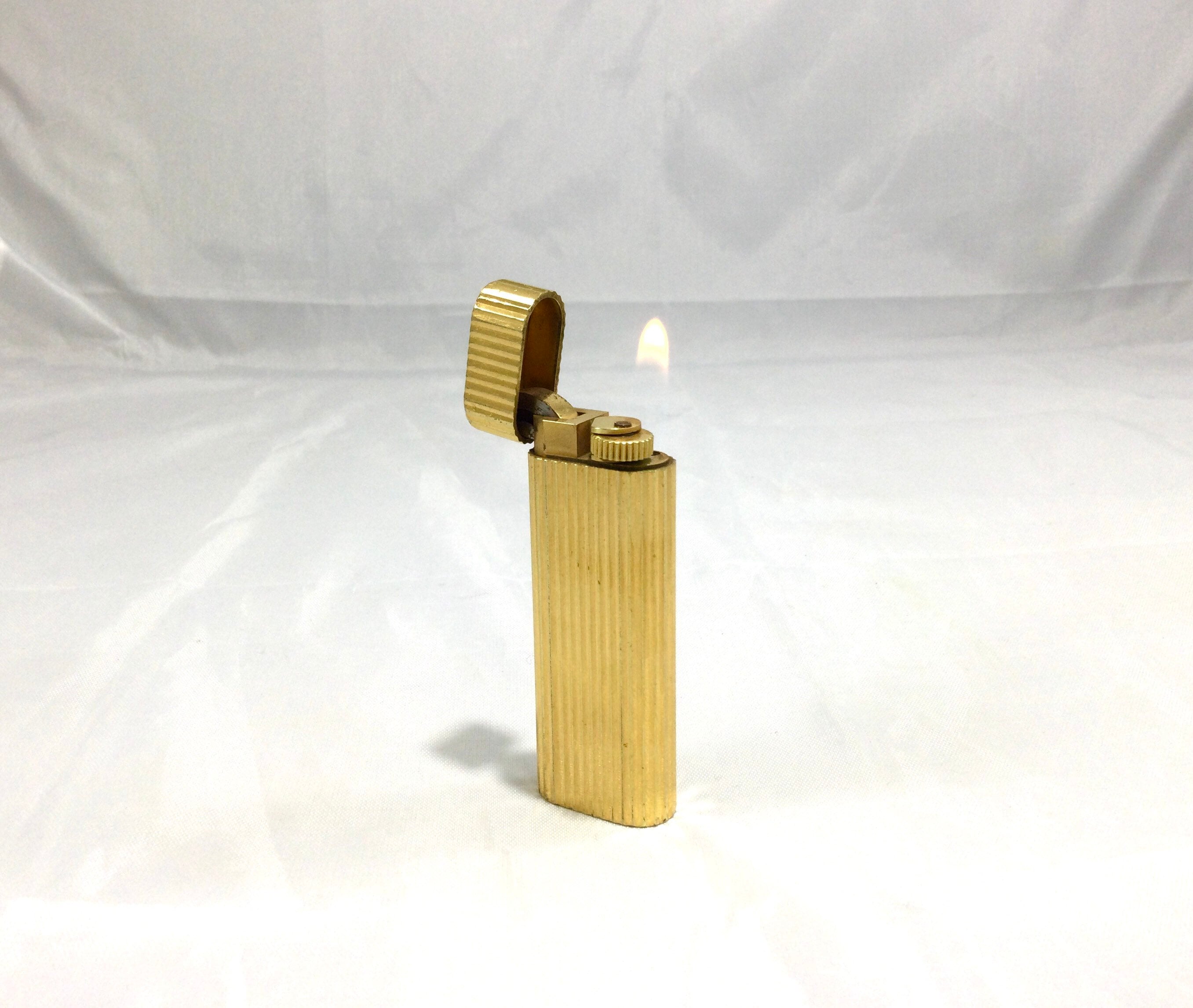 Cartier lighter gold plated price sale