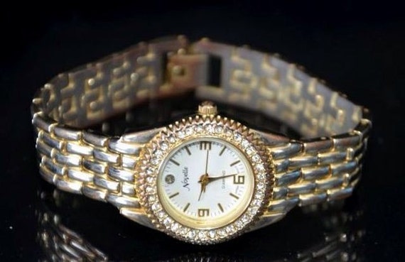 Vintage Ladies Novelle Quartz Brushed Gold Tone Diamond Bezel Watch  Featuring Original Snap Clasp Band 