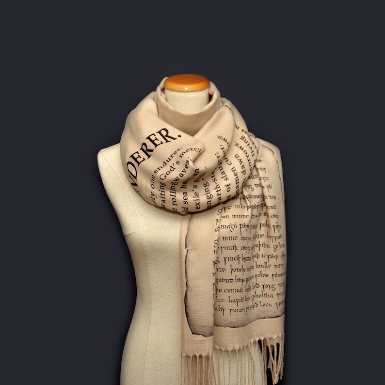 May include: A beige scarf with black text printed on it. The text is from a poem and includes the words "DERER", "endures", "God's mercy", and "rolling waves".