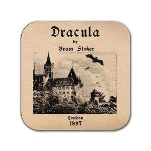 May include: A black and white illustration of a castle with a bat flying overhead. The text "Dracula" by "Bram Stoker" is at the top of the image. The text "London 1897" is at the bottom of the image.