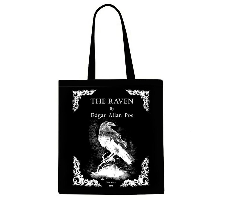 May include: Black tote bag with a white design featuring a raven and the text "THE RAVEN by Edgar Allan Poe".