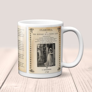 May include: A white ceramic mug with a vintage illustration of a woman in a white dress and a man in a black suit. The text on the mug reads "Clarissa: The History of a Young Lady" by S. Richardson, 1748.
