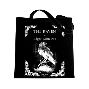 May include: Black tote bag with a white design featuring a raven, the title "THE RAVEN" by Edgar Allan Poe, and the publication details "New York 1845".