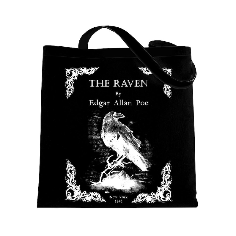 May include: Black tote bag with a white design featuring a raven, the title "THE RAVEN" by Edgar Allan Poe, and the publication details "New York 1845".