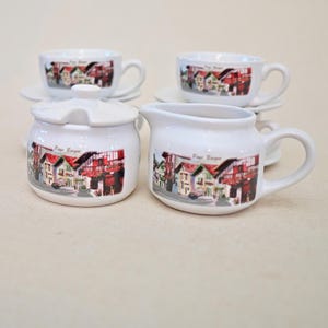 Set of 4 Coffee Cups Milk and Sugar Pot Stoneware marked Pays Basque  traditional village scene Han Sa pottery stamp with 2 horses