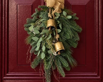 Fresh Christmas Door Swag With Cow Bells And Winter Foliage