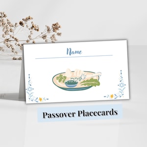 May include: A set of three ceramic mugs with a speckled, matte finish. The mugs are in shades of cream, light gray, and dark gray. Each mug has a simple, minimalist design, perfect for coffee or tea.