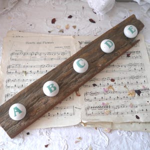 Vintage Wood and Ceramic Peg Rack