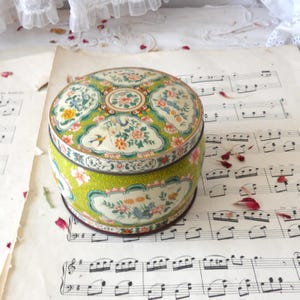 Piccola scatola decorativa rotonda floreale vintage