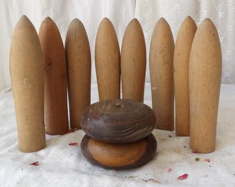 A Set of Vintage Wooden Skittles with Two Wooden Cheeses
