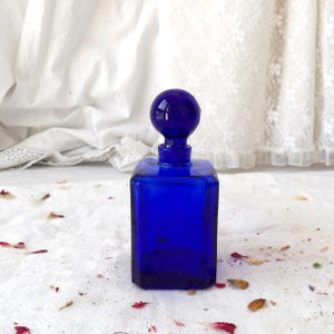 Vintage Blue Bottle with Glass Stopper