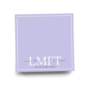 May include: A square, lavender-colored card with a white border. The text "L.M.F.T." is centered, with "Licensed Marriage and Family Therapist" above and "YOUR NAME HERE" below, all in a white, elegant font.