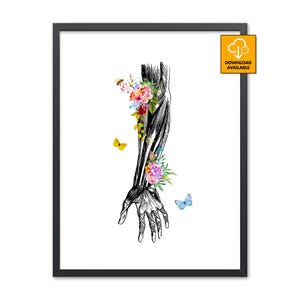 May include: A framed wall art print featuring a black and white anatomical illustration of a human arm and hand. The arm is adorned with vibrant, colorful watercolor flowers, green leaves, a small bee, and two butterflies in yellow and blue.