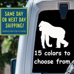 May include: White gorilla silhouette decal sticker for a car. The sticker says "15 colors to choose from".
