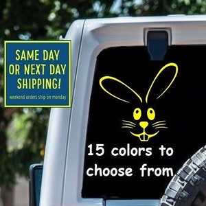 May include: A white Jeep with a yellow bunny rabbit decal on the back window. The decal says "15 colors to choose from".