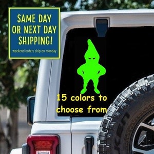May include: A white Jeep with a green cartoon character sticker on the back window. The sticker says "15 colors to choose from".