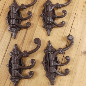 Victorian Eastlake Cast Iron Clip . (TWS) Victorian Eastlake Cast Iron Clip . (TWS)