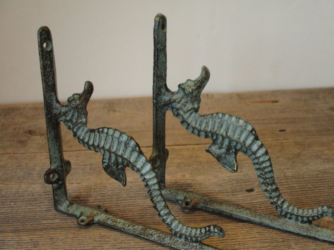 4 hierro fundido náutico SEAHORSE soportes de caballo de mar | Etsy