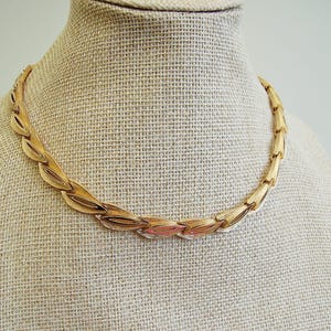 1970s Designer Trifari Gold Tone Filigree and Black Glass