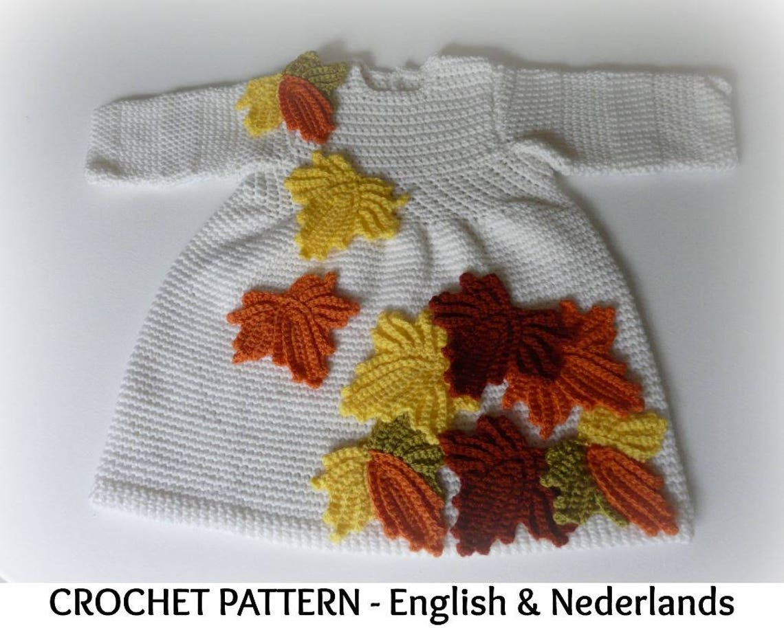 white crocheted dress with scattered crocheted leaves