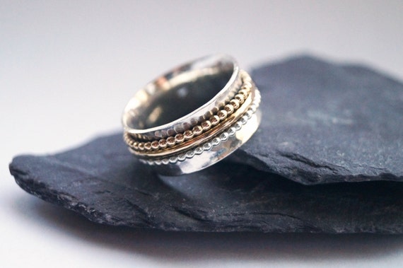 Spin Ring with Three Gold Spinning Bands Hammered Antiqued Sterling Silver Spin Ring with Three Gold Spinning Bands Hammered Antiqued Sterling Silver