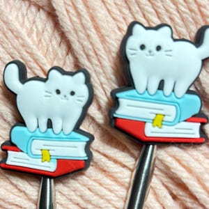 White Cat on Books Knitting Needle Protectors US 2-13, Silicone Stitch Stoppers Pair, Cute Book Lover Knitter Gift