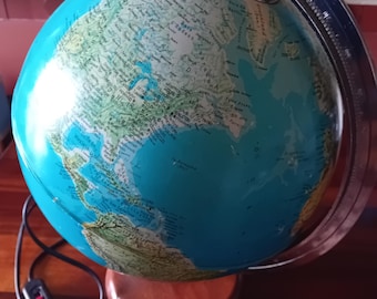 Globe terrestrial 1970s vintage French text with electric light