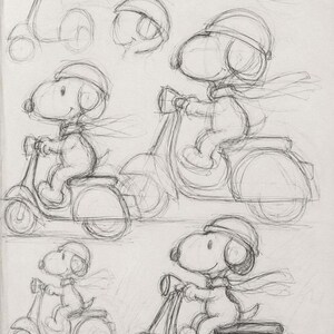 May include: A graphite pencil sketch on paper featuring multiple character studies of a beagle wearing a helmet and scarf while riding a motor scooter. The drawings include various poses and head angles, showcasing the character in motion.