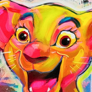 May include: A vibrant, close-up painting of a lion cub with a joyful expression. The artwork features bold brushstrokes and a bright color palette of yellow, orange, pink, and blue. The cub's eyes are large and expressive, with a wide, open mouth.