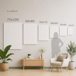May include: A display of blank white canvas art in various sizes, including 20x30, 30x40, 40x60, 50x70, 60x80, and 75x100 cm. The canvases are mounted on a light-colored wall, with a silhouette of a person for scale. The image includes a neutral-toned interior design.