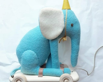 Pull along elephant on wheels