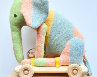 Pull along elephant on wheels. Limited edition.