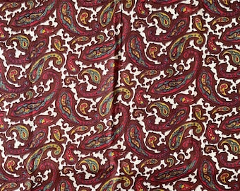 Tela de viscosa vintage de los años 70 con estampado paisley en tonos morados y marrones, tela clásica para costura con diseño escandinavo.
