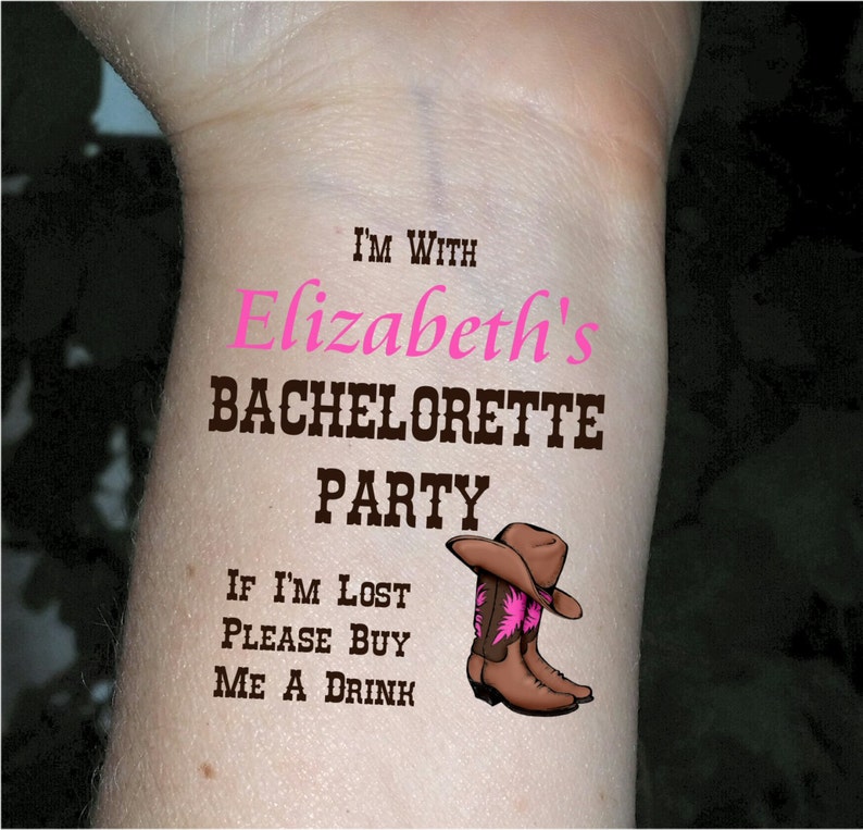 May include: A temporary tattoo with the text "I'm with Elizabeth's Bachelorette Party. If I'm lost please buy me a drink." and a cartoon image of a brown cowboy boot with a pink flower.