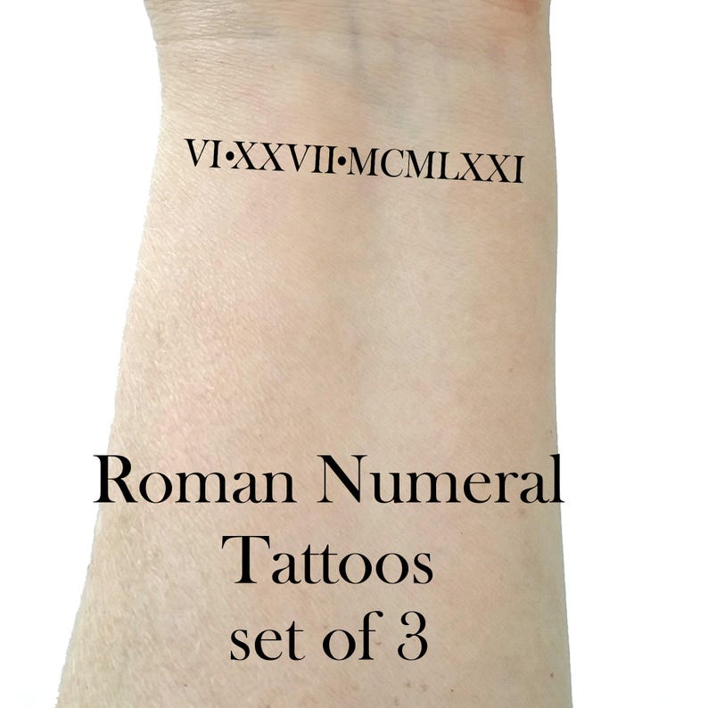 May include: A set of three temporary Roman numeral tattoos. The tattoos feature the Roman numerals VI, XXVIII, and MCMXXI.