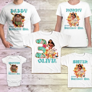 May include: Set of five white t-shirts featuring Moana and Maui characters from the Disney film Moana. The shirts have the text "Daddy", "Mommy", "Brother", "Sister", and "Olivia" with the number "3" on the girl's shirt. The shirts are perfect for a family celebrating a birthday.