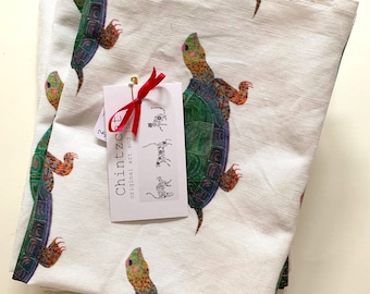 Tea towel, cotton-linen mix with animal design of "Tenacious the Turtle" (pattern repeat)