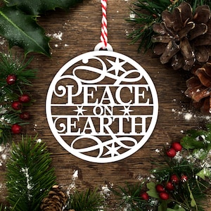 Modello di carta ritagliata "Pace sulla Terra" Decorazione di palline di Natale in formato PDF JPEG per il taglio a mano e SVG per Silhouette Cameo o Cricut