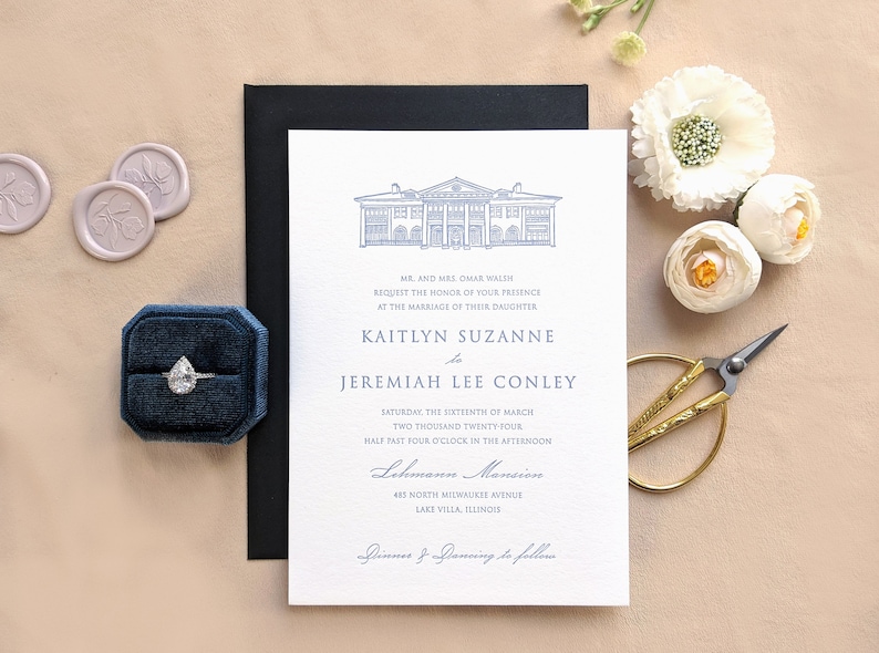 May include: A wedding invitation with a blue and white illustration of a building. The invitation reads "Mr. and Mrs. Omar Walsh request the honor of your presence at the marriage of their daughter Kaitlyn Suzanne to Jeremiah Lee Conley Saturday, the sixteenth of March, two thousand twenty-four, half past four o'clock in the afternoon, Lehmann Mansion, 483 North Milwaukee Avenue, Lake Villa, Illinois. Dinner and dancing to follow."